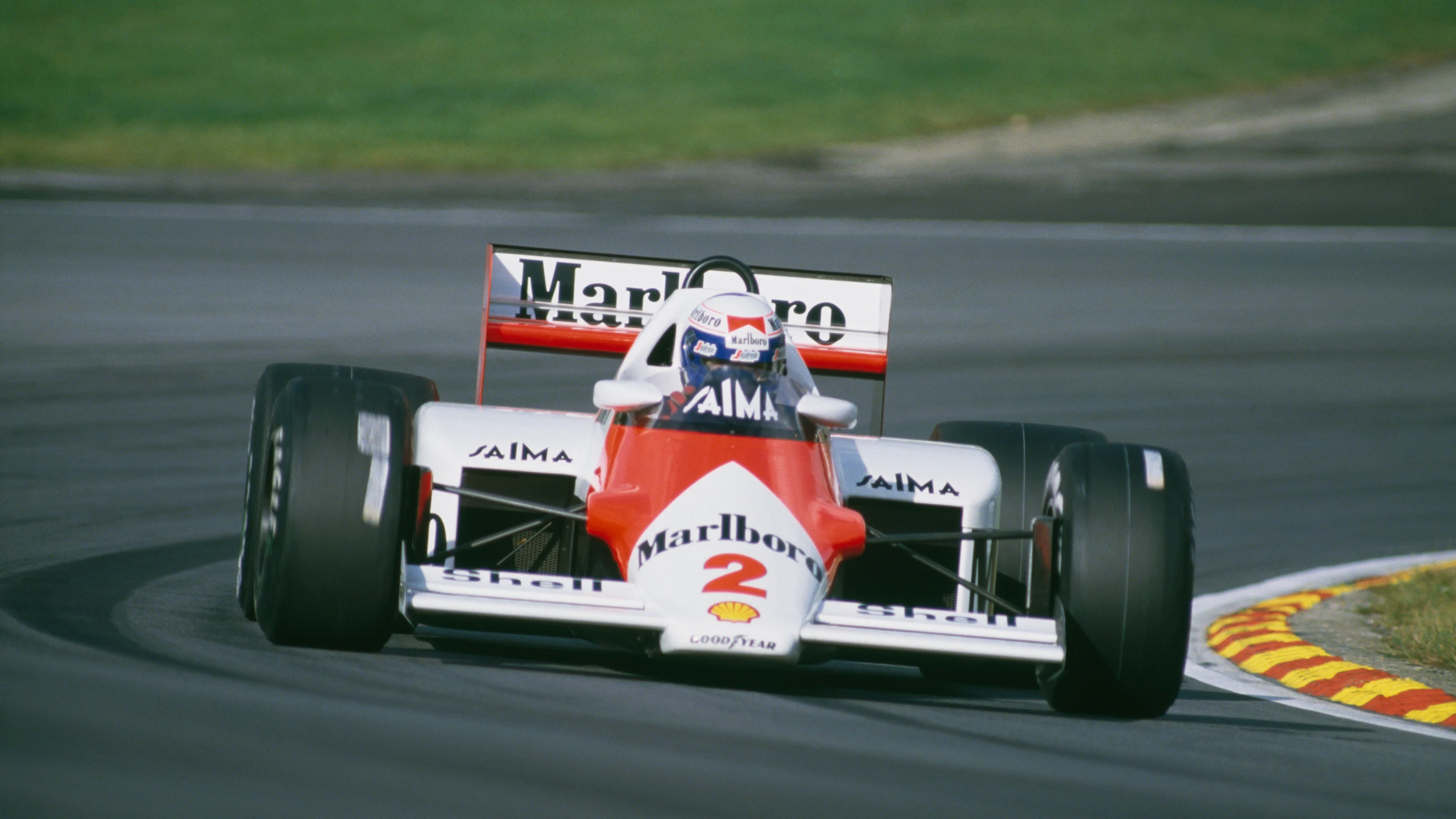 French racing driver Alain Prost driving a Marlboro McLaren in the European Grand Prix at Brands